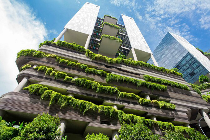 Green nature facade on modern futuristic building in Singapore city